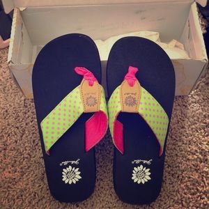 Yellow box flip flops